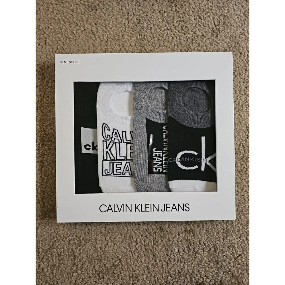 Calvin Klein Men's 4-Pack Sneaker Sock Liners Black White Gray One Size